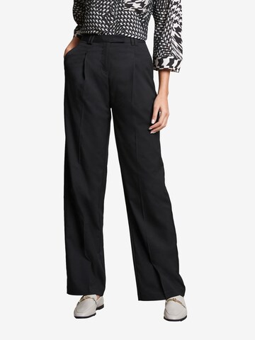 Wide leg Pantaloni con pieghe di Next in nero: frontale