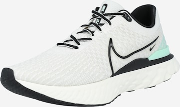 Chaussure de course 'Infinity 3' NIKE en blanc : devant