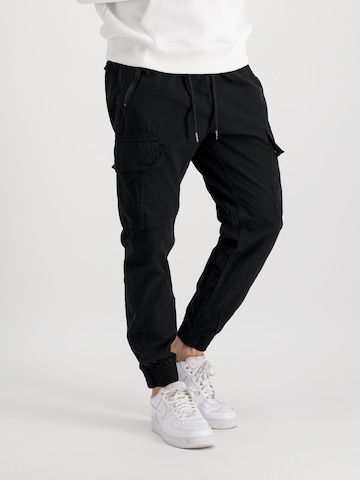 ALPHA INDUSTRIES Tapered Cargo Pants 'Ripstop' in Black: front