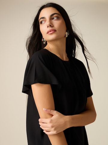 Camicia da donna di oltre in nero