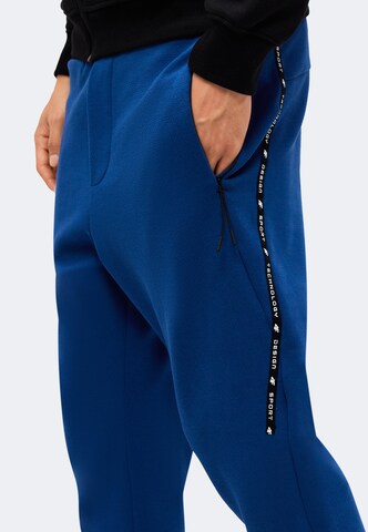 Tapered Pantaloni sport de la 4F pe albastru: lateral