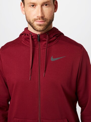 NIKE Sportsweatjacke in Rot