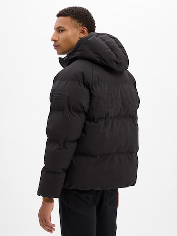 ELLESSE Winter jacket in Black