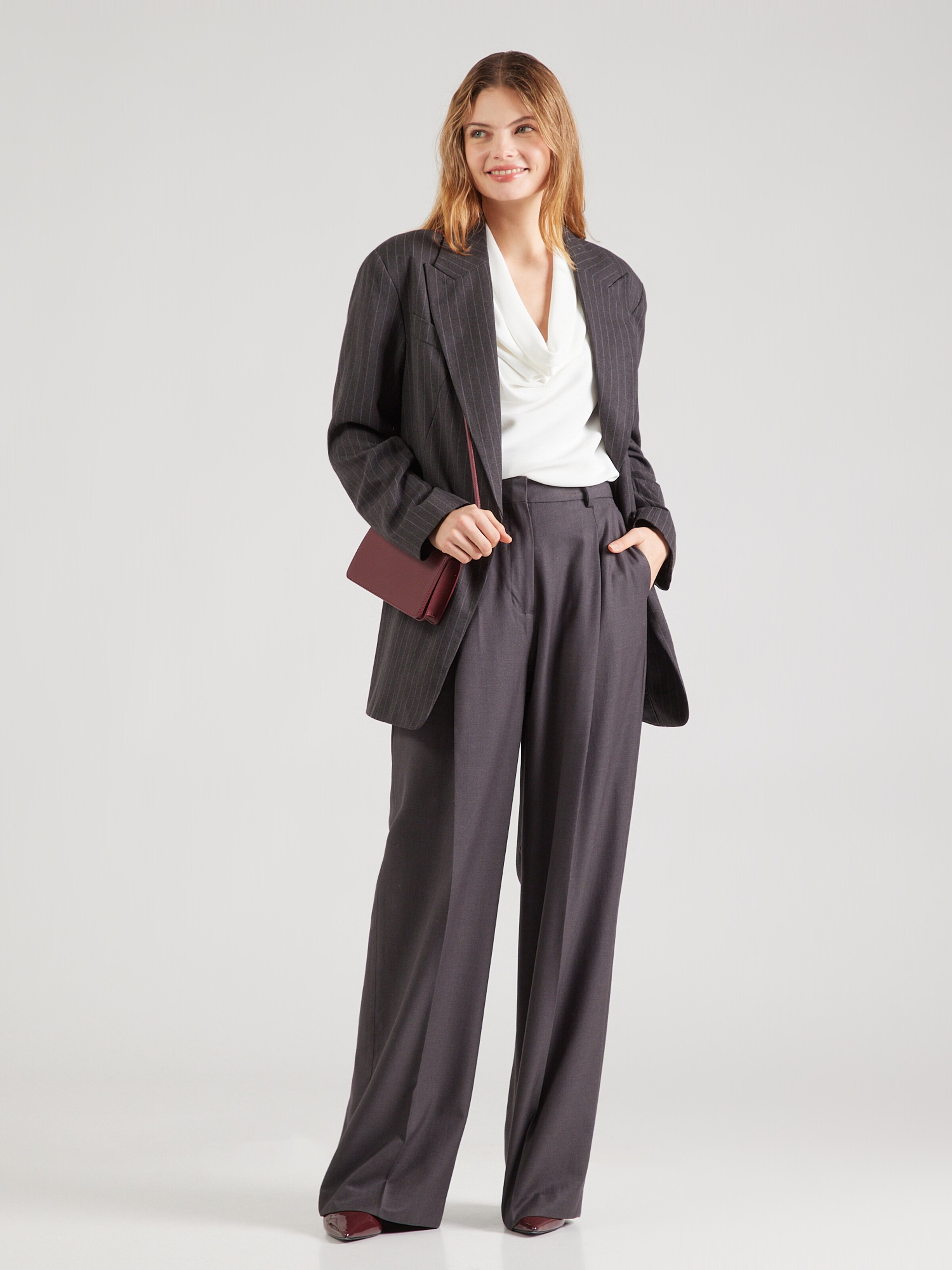 Joseph Ribkoff lurex top watervalhals in zilver | BeOne