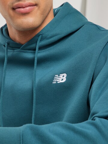 new balance Tréning póló 'Sport Essentials' - kék