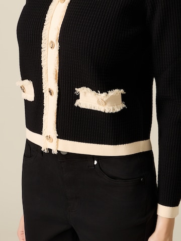 Cardigan oltre en noir