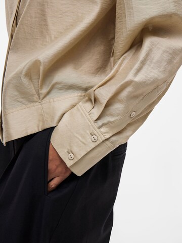 ROUGE EDIT Blouse in Beige