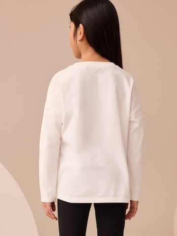 T-Shirt Next en blanc