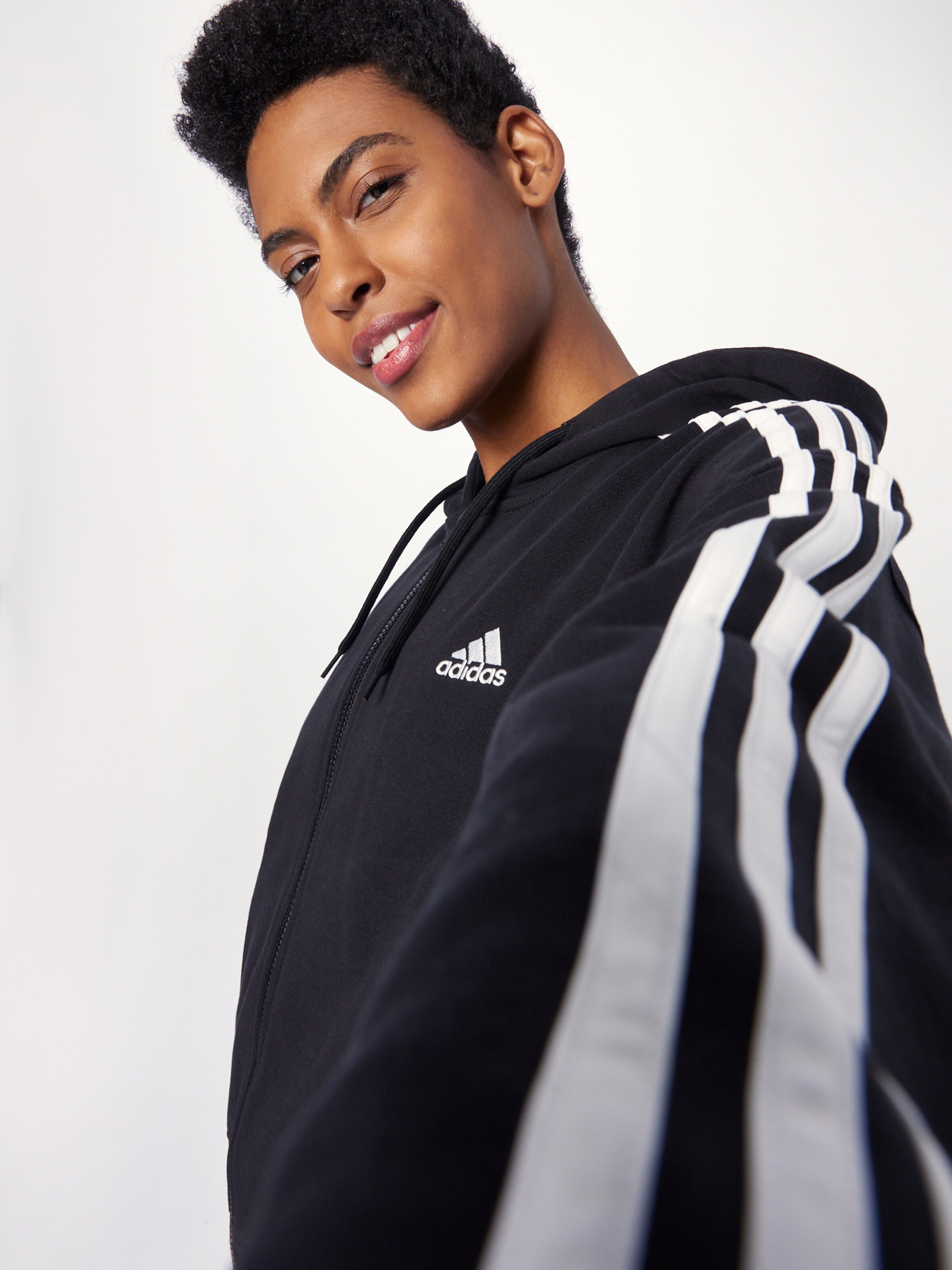 ADIDAS SPORTSWEAR Sports sweat jacket Essentials 3 Stripes French Terry in Black ABOUT YOU