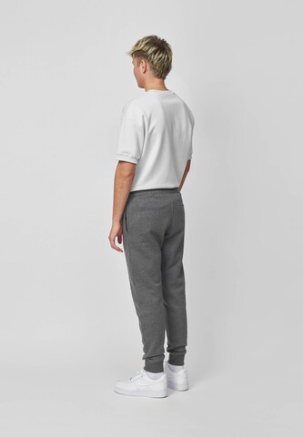 SNOCKS Tapered Sporthose in Grau