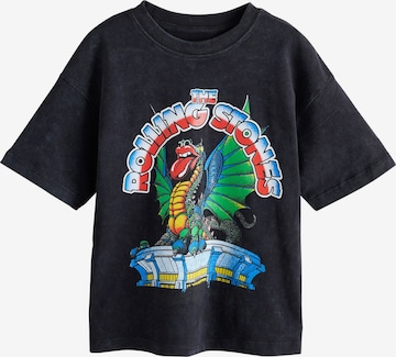 Tricou de la Next pe negru: față