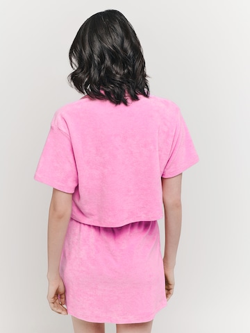 UNFOLLOWED x ABOUT YOU - Camiseta 'BREEZY' en rosa: atrás