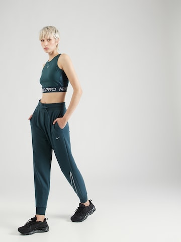 NIKE Tapered Sportbroek 'ONE PRO' in Groen