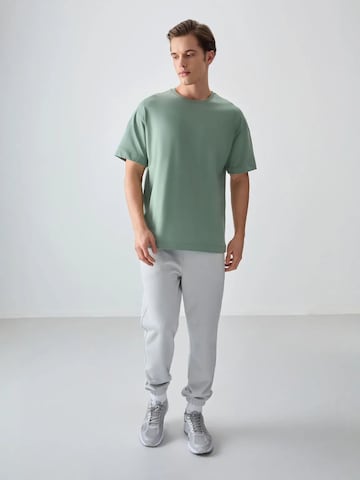Tommy Life T-Shirts in Grün