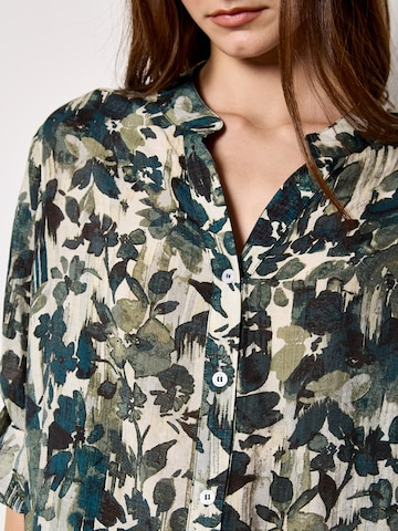 Chemisier Apricot en vert