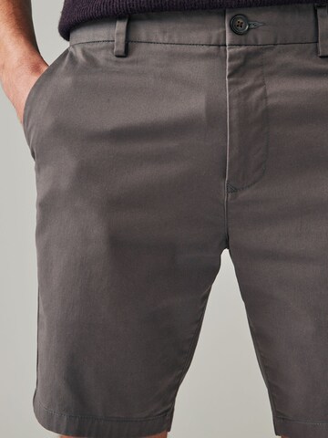 Skinny Pantaloni chino di Next in blu