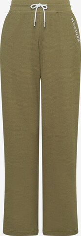 Loosefit Pantalon TOMMY HILFIGER en vert : devant