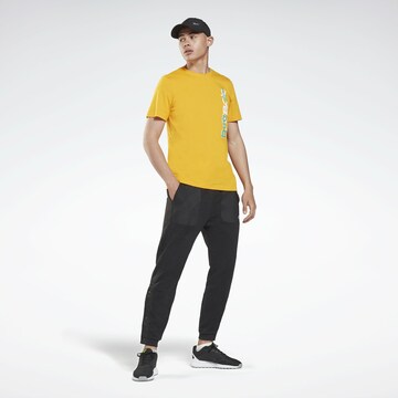 T-Shirt fonctionnel Reebok en jaune