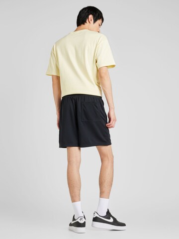 Regular Pantaloni 'Club' de la Nike Sportswear pe negru