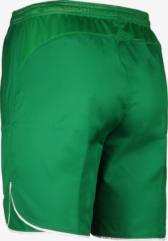 NIKE Loose fit Workout Pants in Green