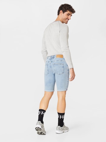 River Island Slimfit Jeans 'SHAGGY' in Blauw