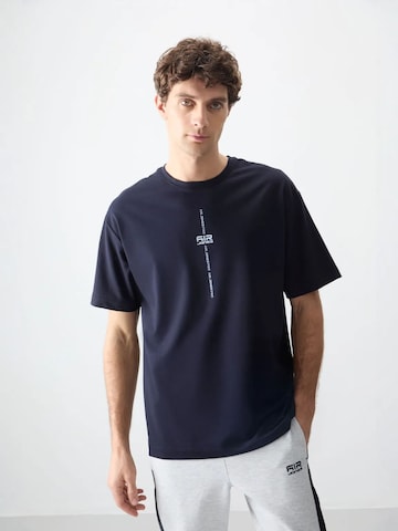 T-Shirt Tommy Life en bleu : devant
