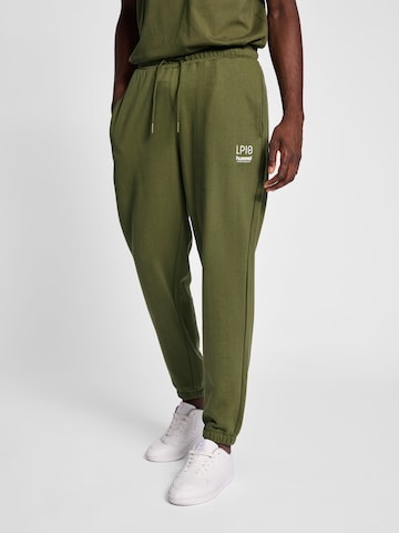 Tapered Pantaloni di Hummel in verde: frontale