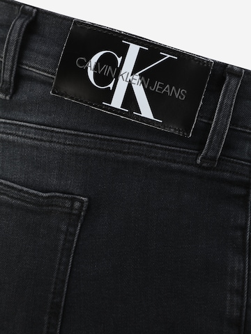 Calvin Klein Jeans Plus ضيق جينز بلون أسود