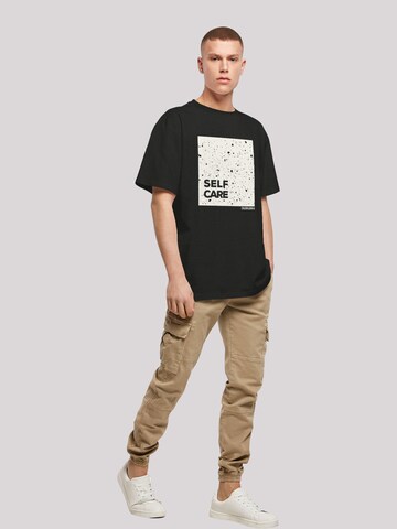 T-Shirt 'SELF CARE' F4NT4STIC en noir