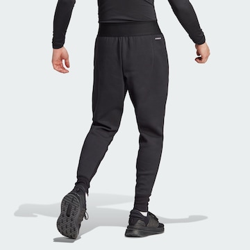 ADIDAS SPORTSWEAR - Tapered Calças de desporto 'Z.N.E. Premium' em preto