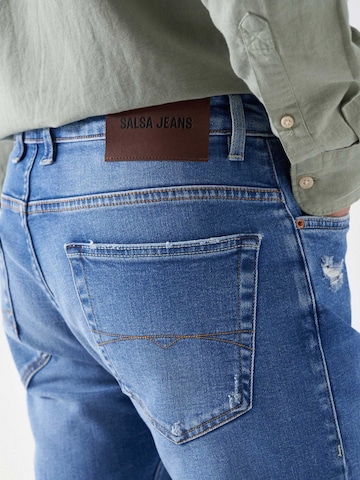 Coupe slim Jean Salsa Jeans en bleu