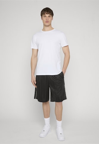 Loosefit Pantaloni di Karl Kani in nero