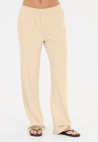Athlecia Regular Sports trousers 'Crecy' in Beige: front