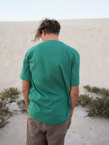 ABOUT YOU Limited Koszulka 'Emil by Levin Hotho' w kolorze zielony