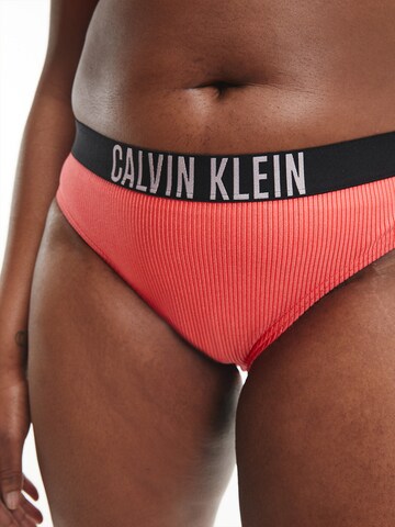 Slip costum de baie de la Calvin Klein Swimwear Plus pe portocaliu