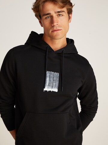 Calvin Klein Jeans Sweatshirt 'BRUSH STROKE' in Schwarz