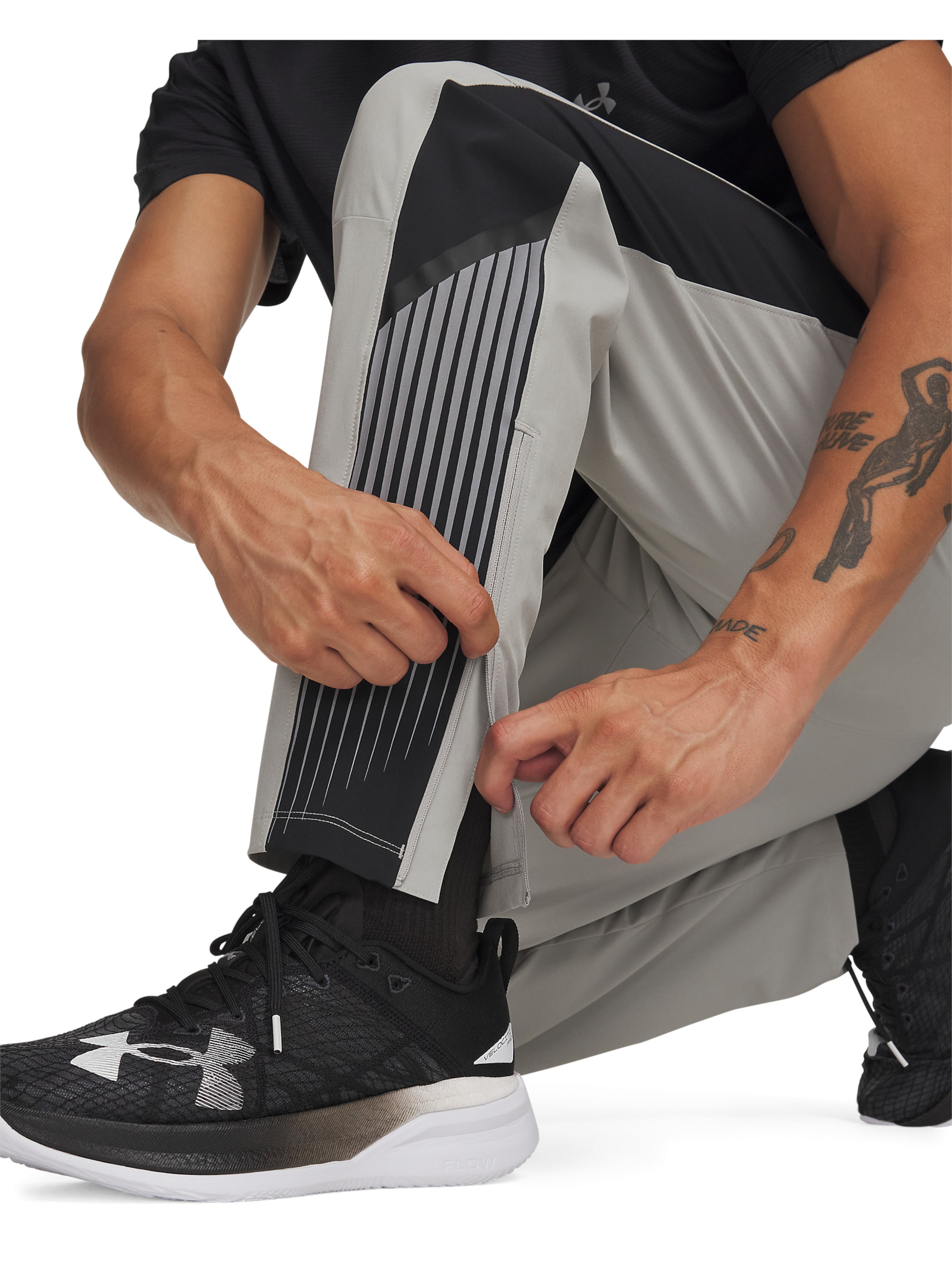UNDER ARMOUR Slim fit Sports trousers 'Velociti' in Grey