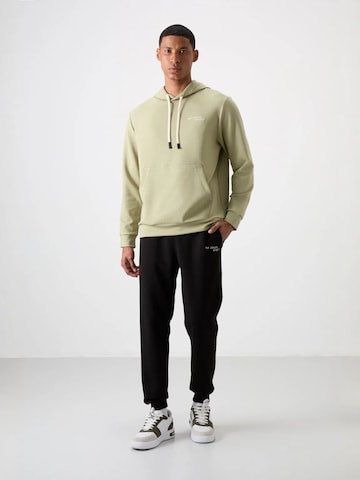 Survêtement Tommy Life en vert : devant