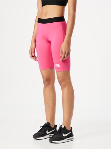 THE NORTH FACE - Skinny Calças de desporto em rosa: frente