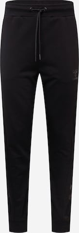 Pantalon de sport Hummel en noir : devant