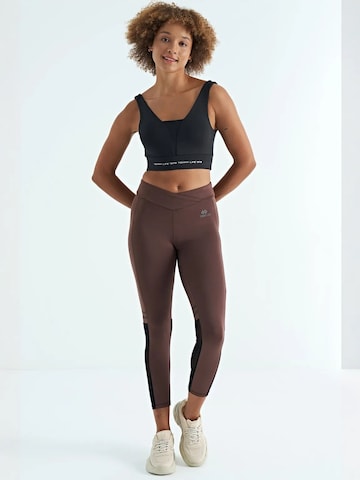 Haut de sport Tommy Life en noir