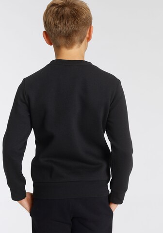 Champion Authentic Athletic Apparel Sweatshirt in Black