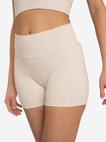 OCEANSAPART - Skinny Pantalón deportivo 'Maya' en beige