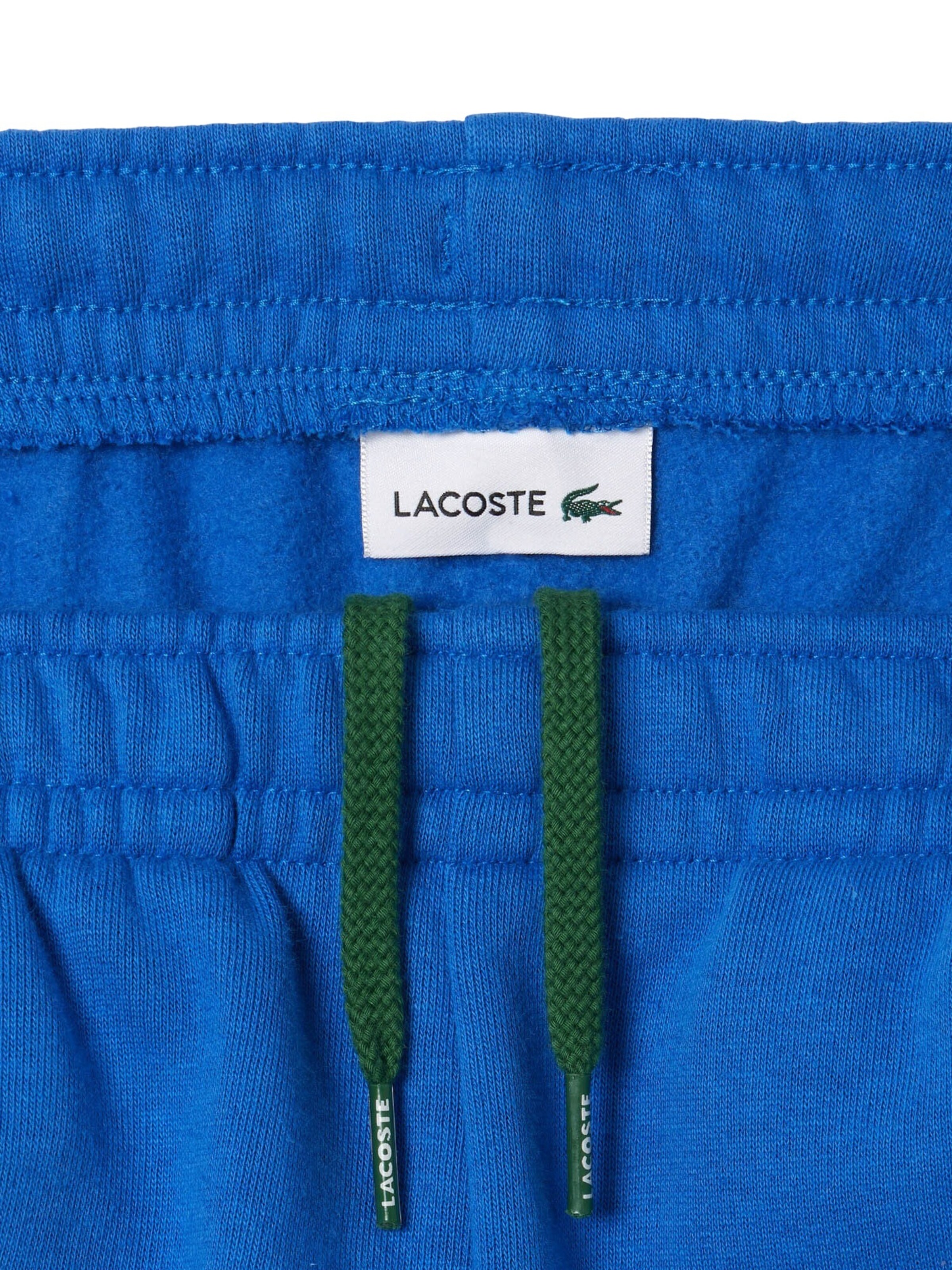 LACOSTE Tapered Trousers in Blue
