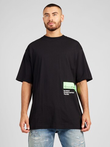 T-Shirt Calvin Klein Jeans en noir : devant