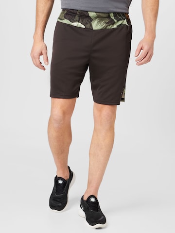 NIKE Regular Sports trousers in Brown: front