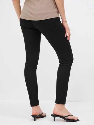 Next Skinny Legginsy w kolorze czarny