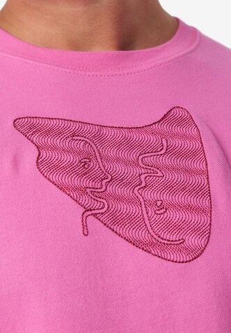 T-Shirt smiler. en rose