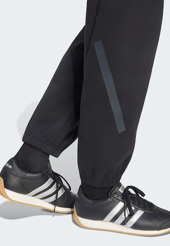 ADIDAS SPORTSWEAR Zúžený strih Športové nohavice 'Z.N.E.' - Čierna