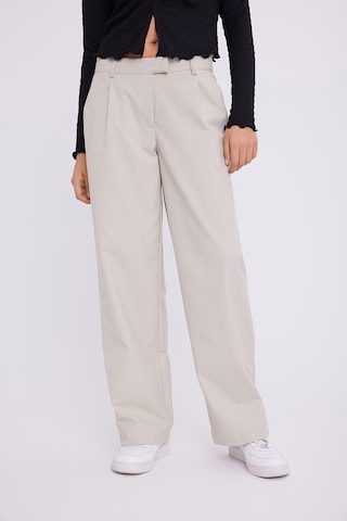 Loosefit Pantalon à pince 'Beta' Envii en beige : devant